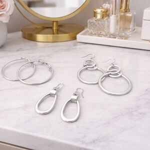 Set of 3 Silvertoned Hoop and Loopy Earrings - Pre-loved